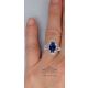oval cut blue sapphire ring in the finger 