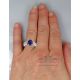 blue sapphire diamond ring on finger