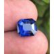 light blue sapphire in hand 