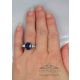 blue diamond ring in finger 