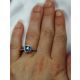 Cushion cut blue sapphire ring in finger 