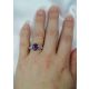 Purple-Oval-Sapphire-&-Diamond-Ring-in-finger 