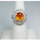 Orange-sapphire-oval-cut-diamonds-ring