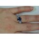 Round blue Sapphire in finger 