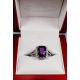 purple sapphire ring in box