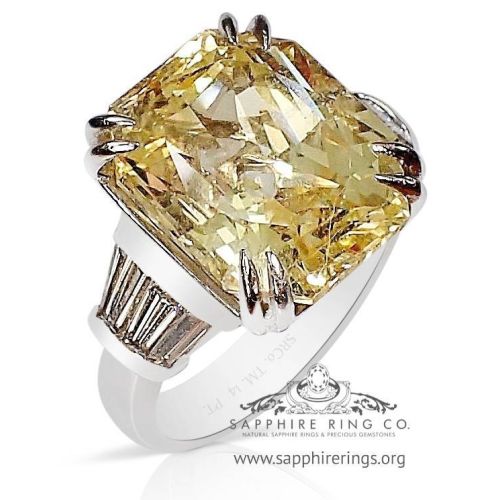 cushion cut yellow sapphire ring in platinum