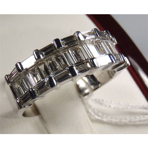 18 kt White Gold Wedding Band set with 2.40 ct's of Baguette Cut Diamonds  ( SOLD )