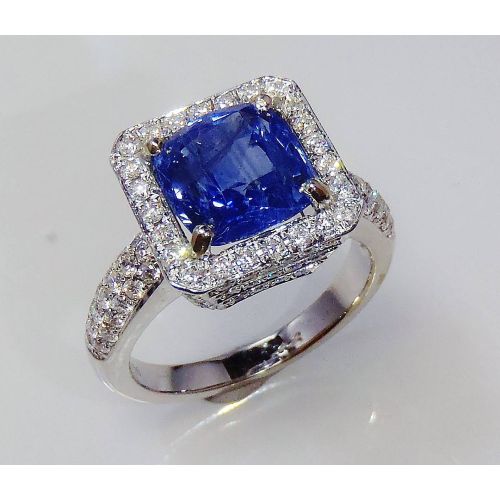 Blue Cushion Sapphire 4.87 tcw -18kt White Gold and Diamond ring 